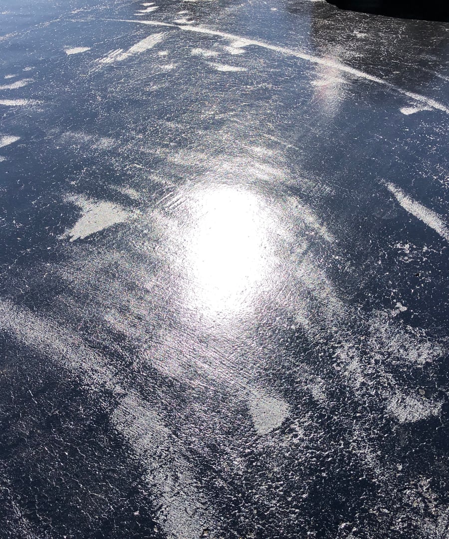 After, a fresh sealed black surface